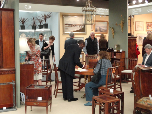 The stand of Edenbridge-based fine period furniture dealer Lennox Cato at the London BADA fair in March where Mr Cato was reporting 